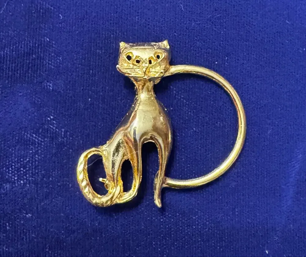 Vintage MCM gold tone cat eyeglass holder pin brooch